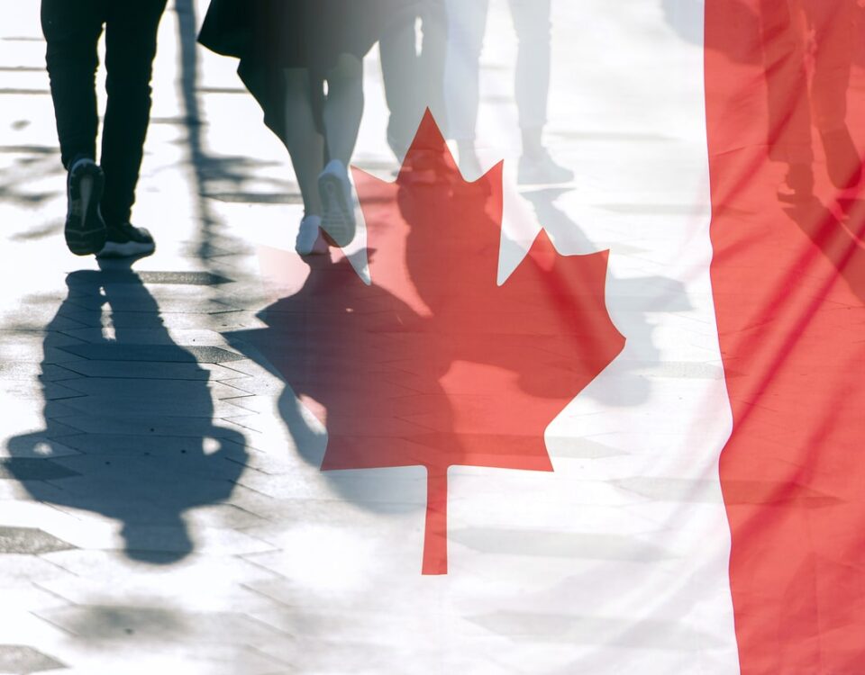 The National Flag of Canada and shadows of people, concept picture